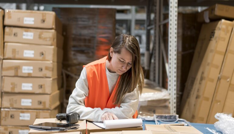 medium-shot-woman-reading-document